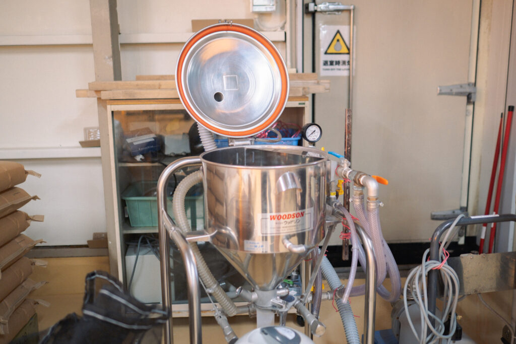 お米の浸漬を行う機械